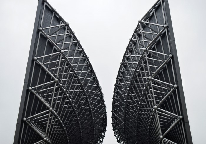 Modern architectural structure with geometric metal framework