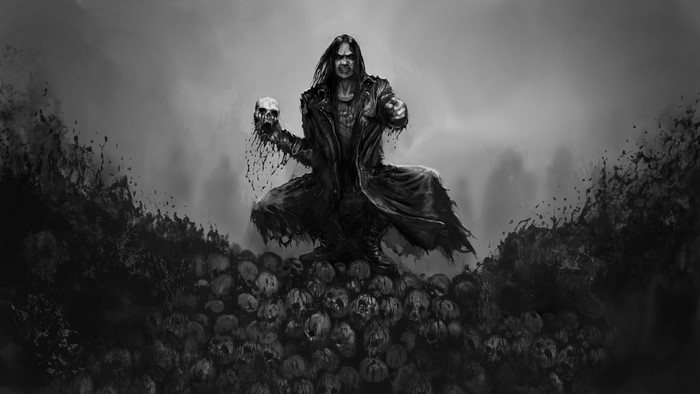 Man holding a skull in a pile of skulls