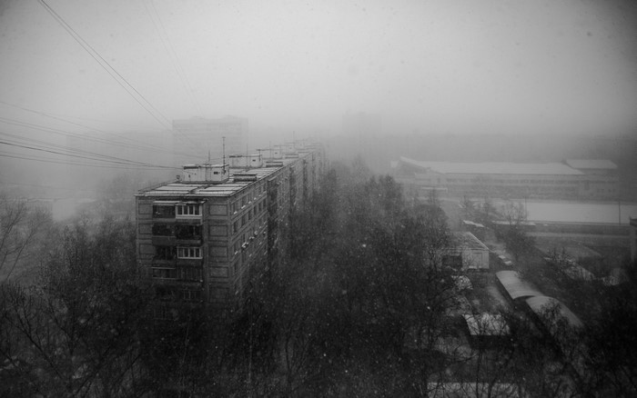 Monochrome view of a city in Russia during snowfall