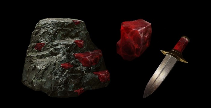 Rock with rubies, loose ruby, and dagger