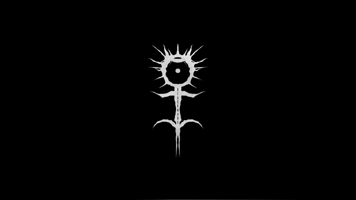 Monochrome symbol with a central eye and spiky crown