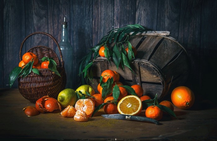 Still life with oranges, lemons, and a basket