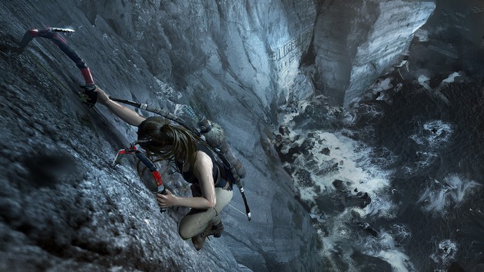 Lara Croft climbing a cliff in Shadow of the Tomb Raider