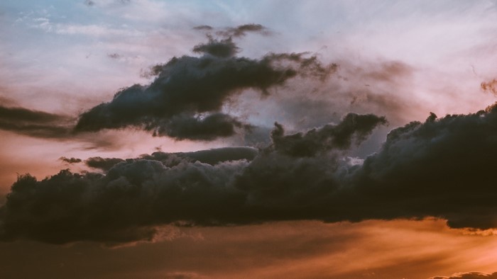 Dramatic sunset clouds over a landscape