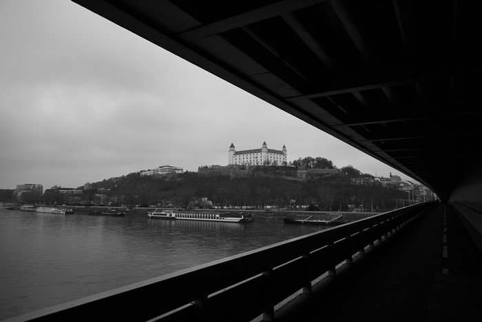 Bratislava Castle and Danube River from under a bridge