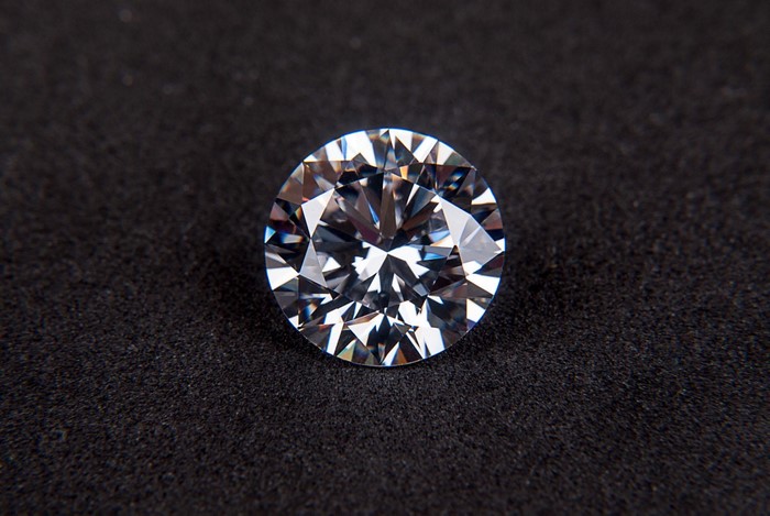 A single diamond on a black background