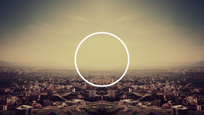 Cityscape with a large white circle overlay