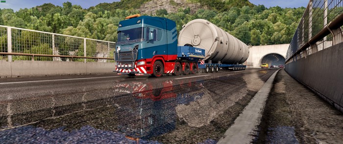Scania truck carrying large cylindrical load in Euro Truck Simulator 2