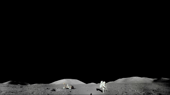 Astronaut and lunar rover on the Moon
