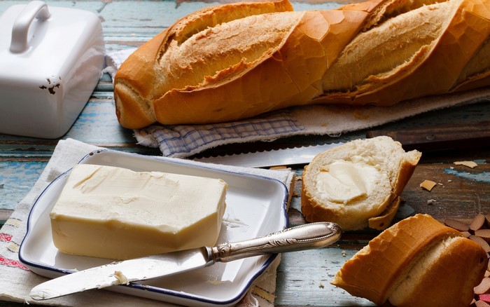 Bread and butter on a wooden table