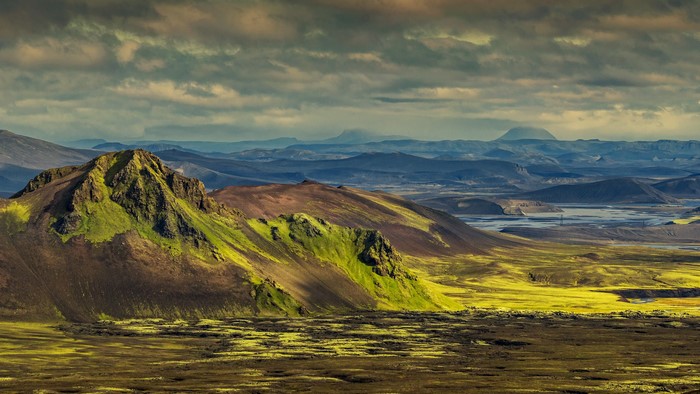 Bleak mountain landscape with green moss