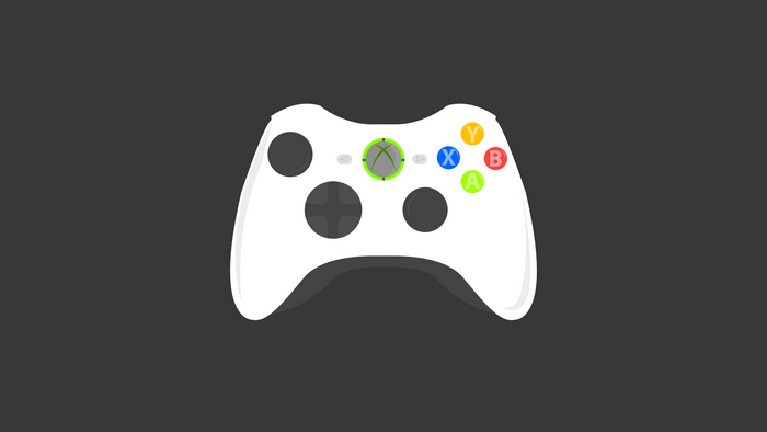 White Xbox 360 controller on a gray background