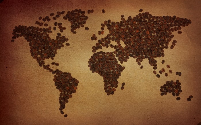 World map made of coffee beans on textured background