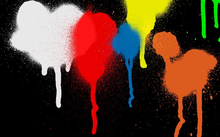 Colorful paint splatters on black background