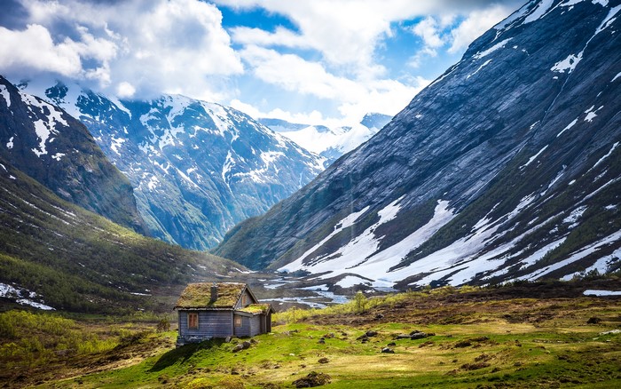 Wooden cabin in a Norwegian mountain valley