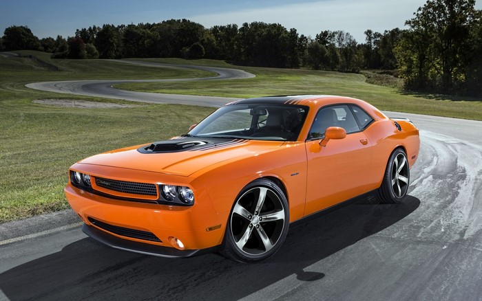 Orange Dodge Challenger on a Racetrack