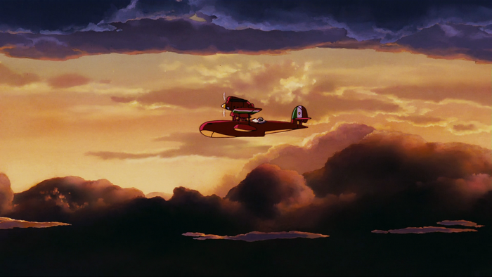 Porco Rosso flying a seaplane at sunset
