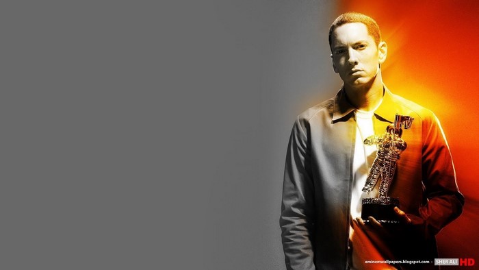 Eminem holding an MTV award
