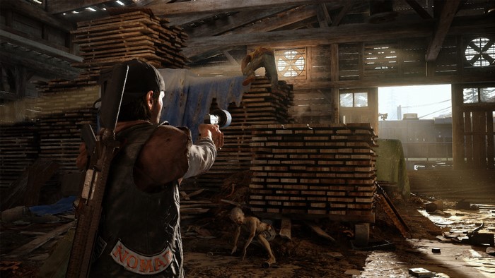 Man with gun in warehouse in Days Gone