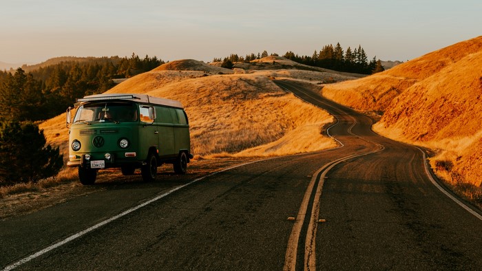 Green Volkswagen Van on a Winding Road in California