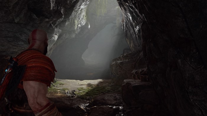 Kratos in a cave in God of War