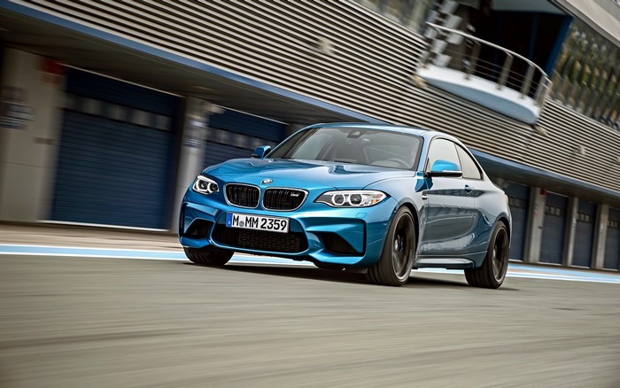 Blue BMW M2 on a Racetrack