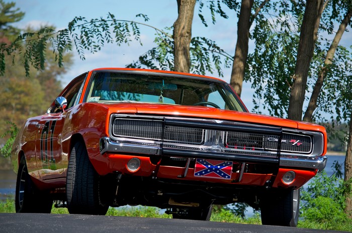 4K Orange Dodge Charger with Confederate Flag