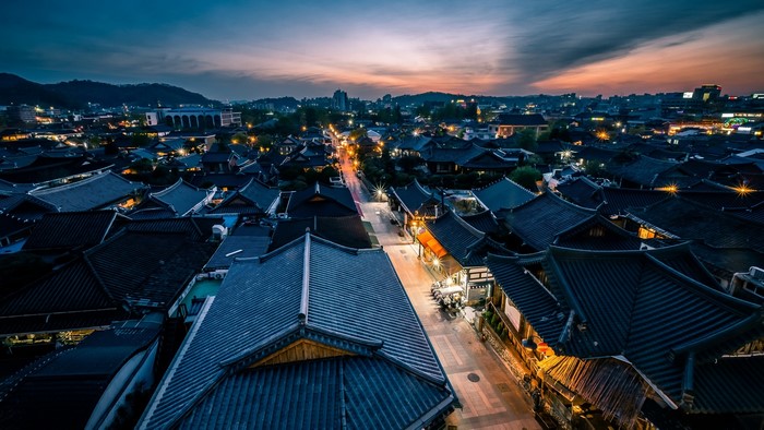 Rooftops of a Korean city at dusk
