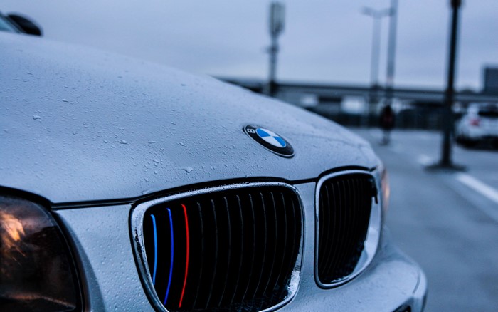 4K BMW 1 Series car with water drops