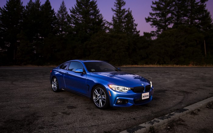 Blue BMW 4 Series Coupe on Paved Lot