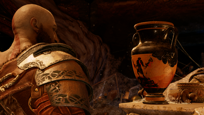 Kratos from God of War examines an ancient vase