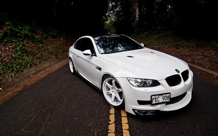 4K White BMW E92 M3 with Colored Wheels on Road