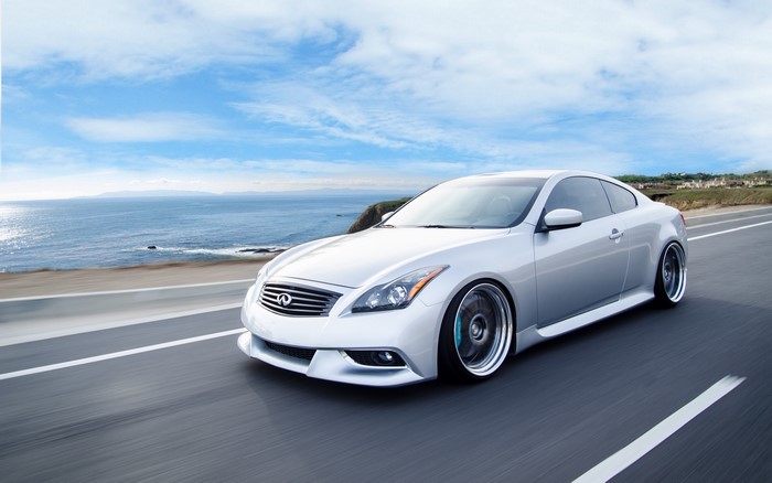 Silver Infiniti G35 Coupe on a Coastal Road