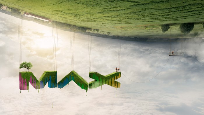 Surreal photo manipulation of MAX text hanging in clouds