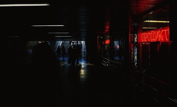 Underground passage with neon sign