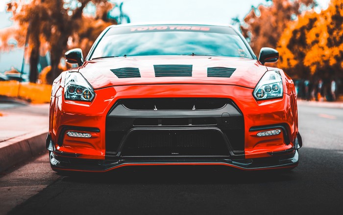 Red Nissan GT-R with TOYO TIRES banner