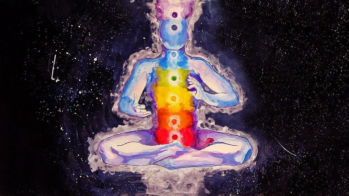 Abstract meditation with chakras in space