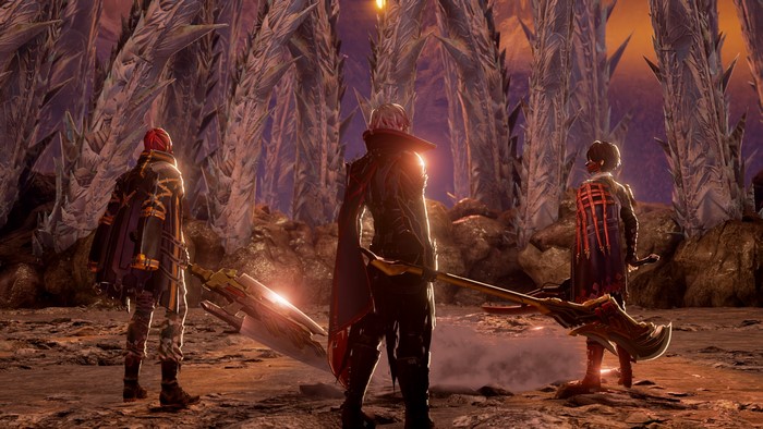 Three characters from Code Vein in a rocky landscape