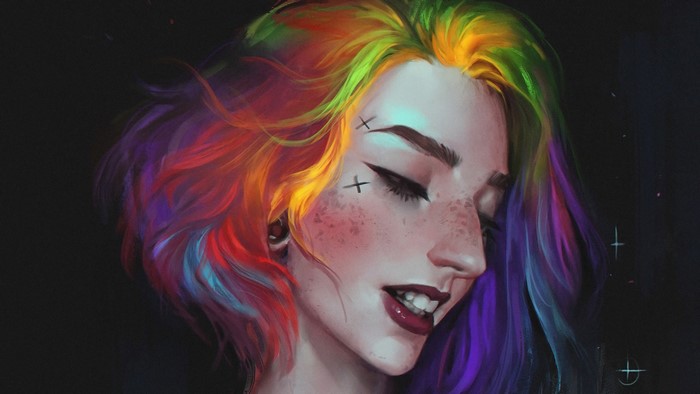 Portrait of a woman with rainbow hair and piercings