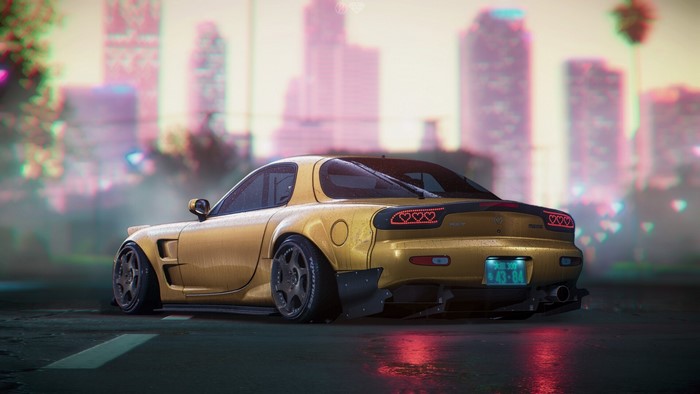 Yellow Mazda RX-7 FD sports car with custom wheels