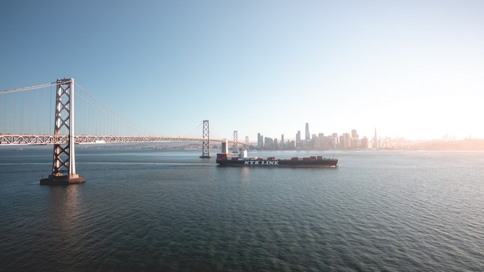 Container ship passes under San Francisco Bay Bridge