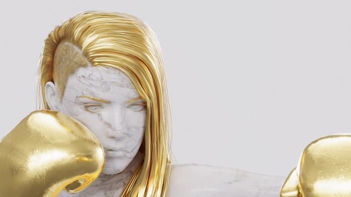 Marble woman with golden hair and boxing gloves