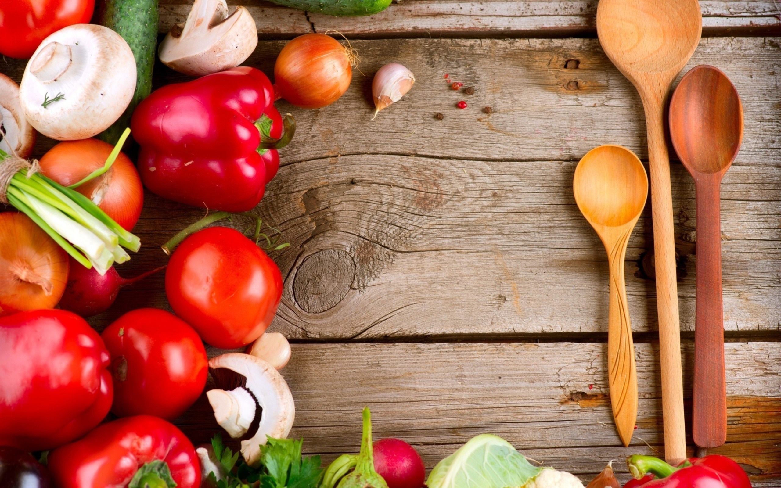 Fresh vegetables and wooden spoons on a rustic surface HD Wallpaper