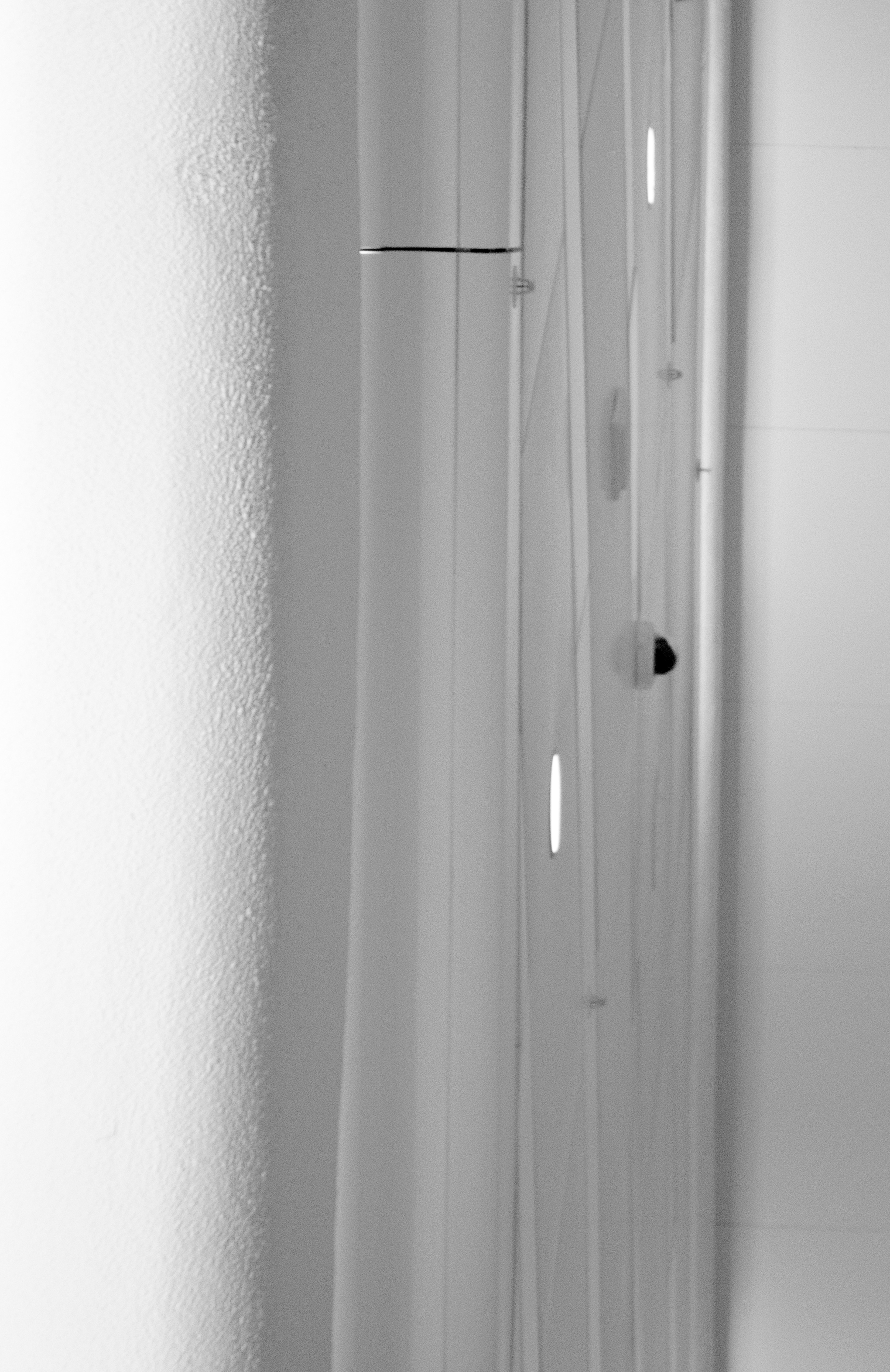 Minimalist interior with textured wall and vertical blinds HD Wallpaper