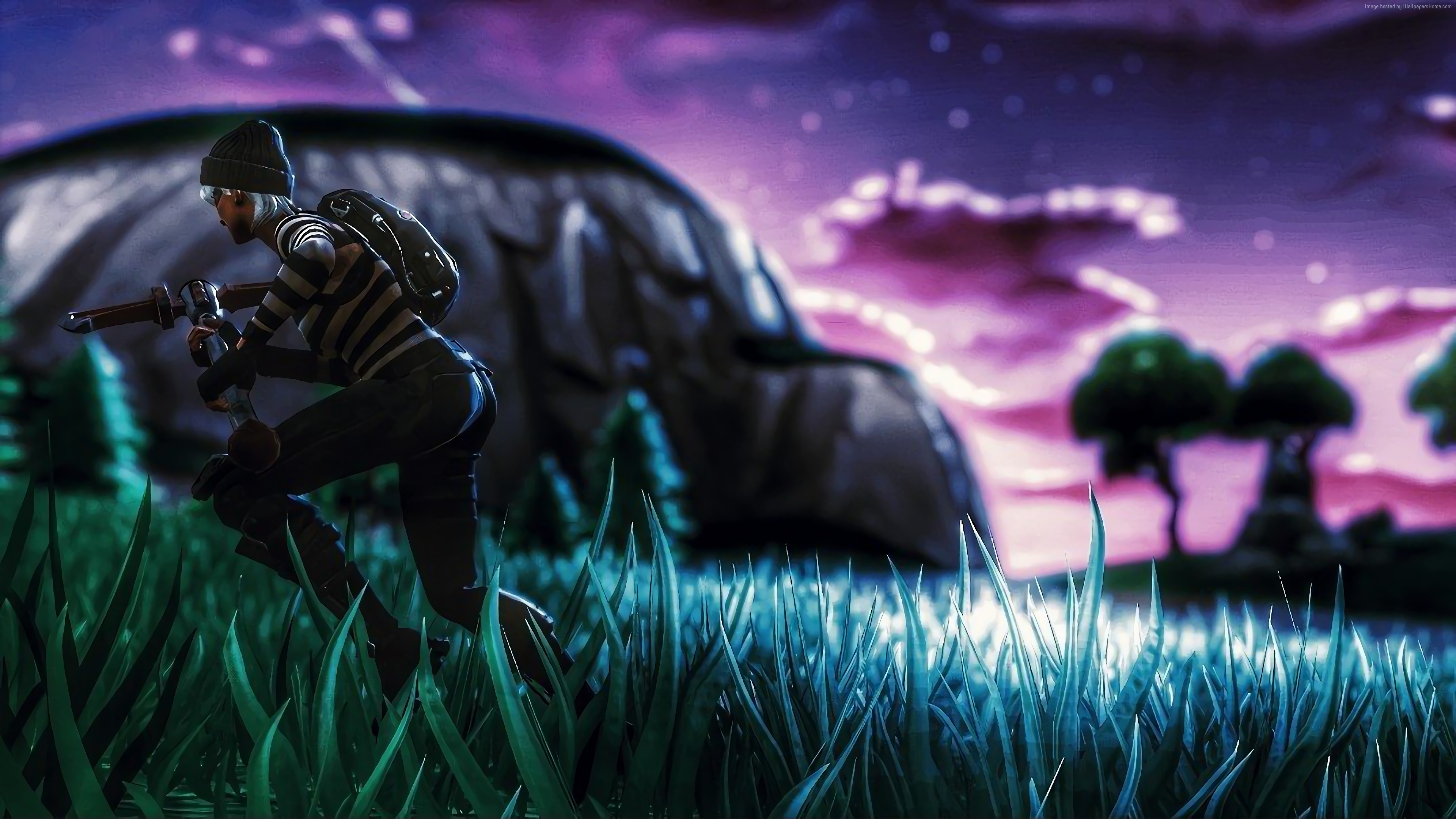 Fortnite character with crossbow in grassy field at dusk HD Wallpaper