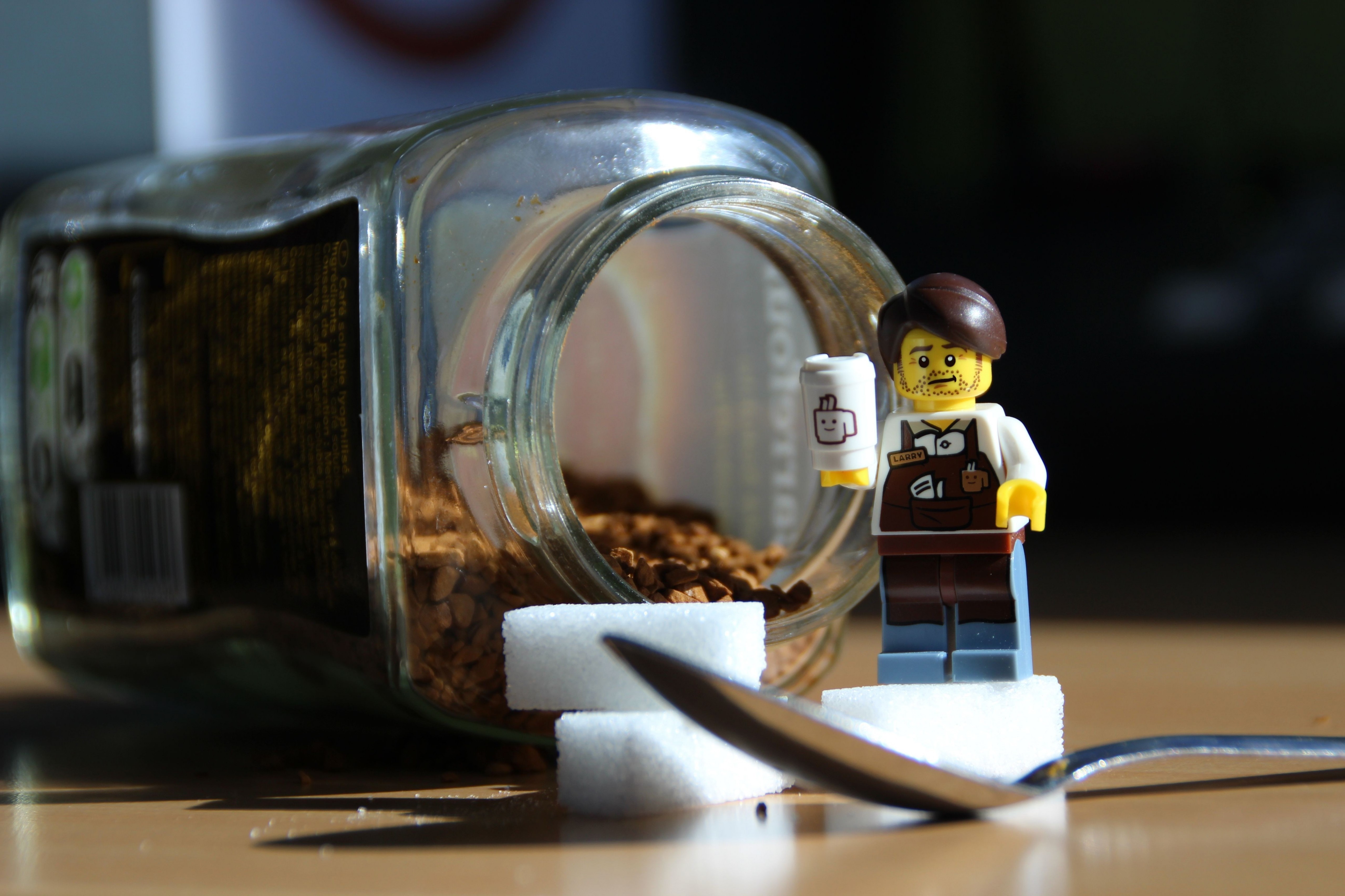 LEGO minifigure with coffee and sugar cubes HD Wallpaper
