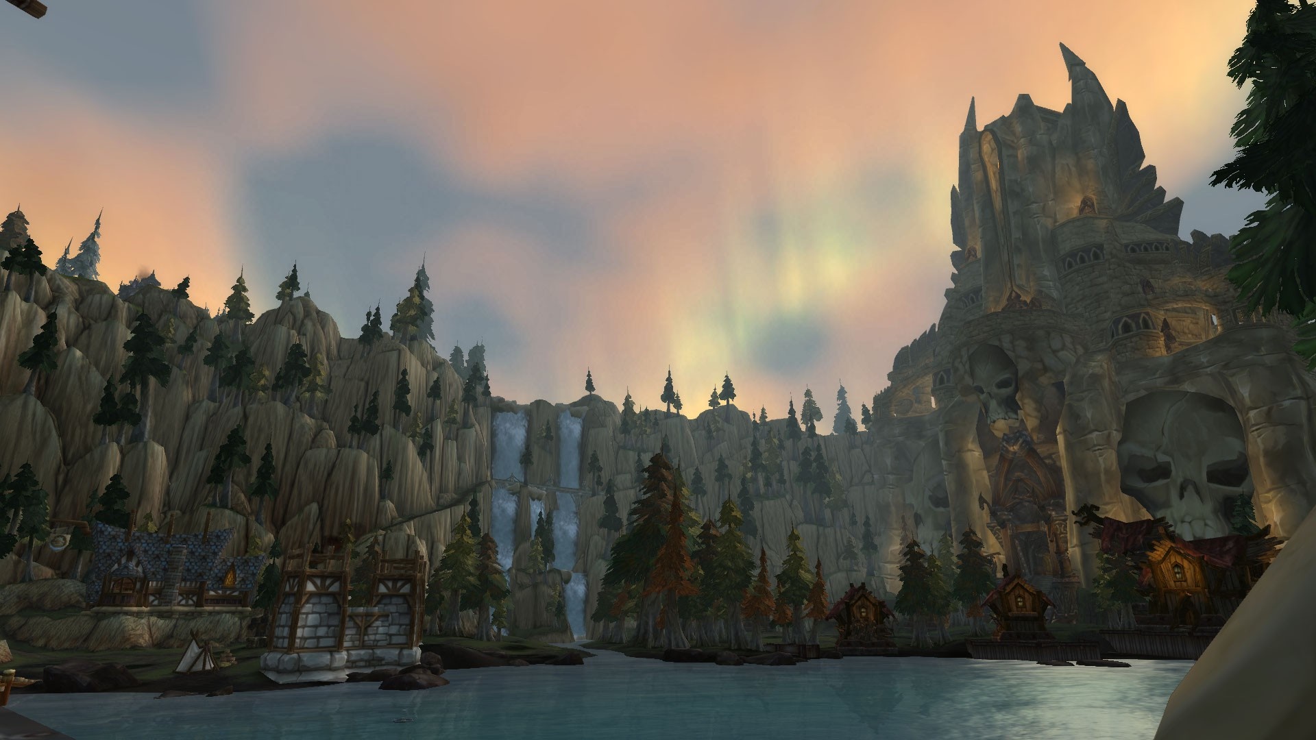 World of Warcraft landscape with waterfalls and skull-shaped cave HD Wallpaper