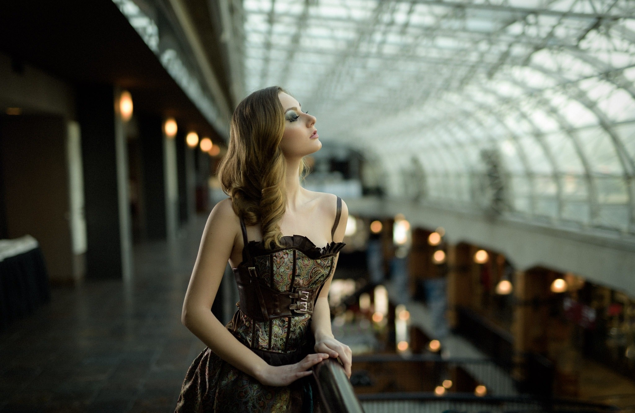 Woman in corset dress posing indoors HD Wallpaper