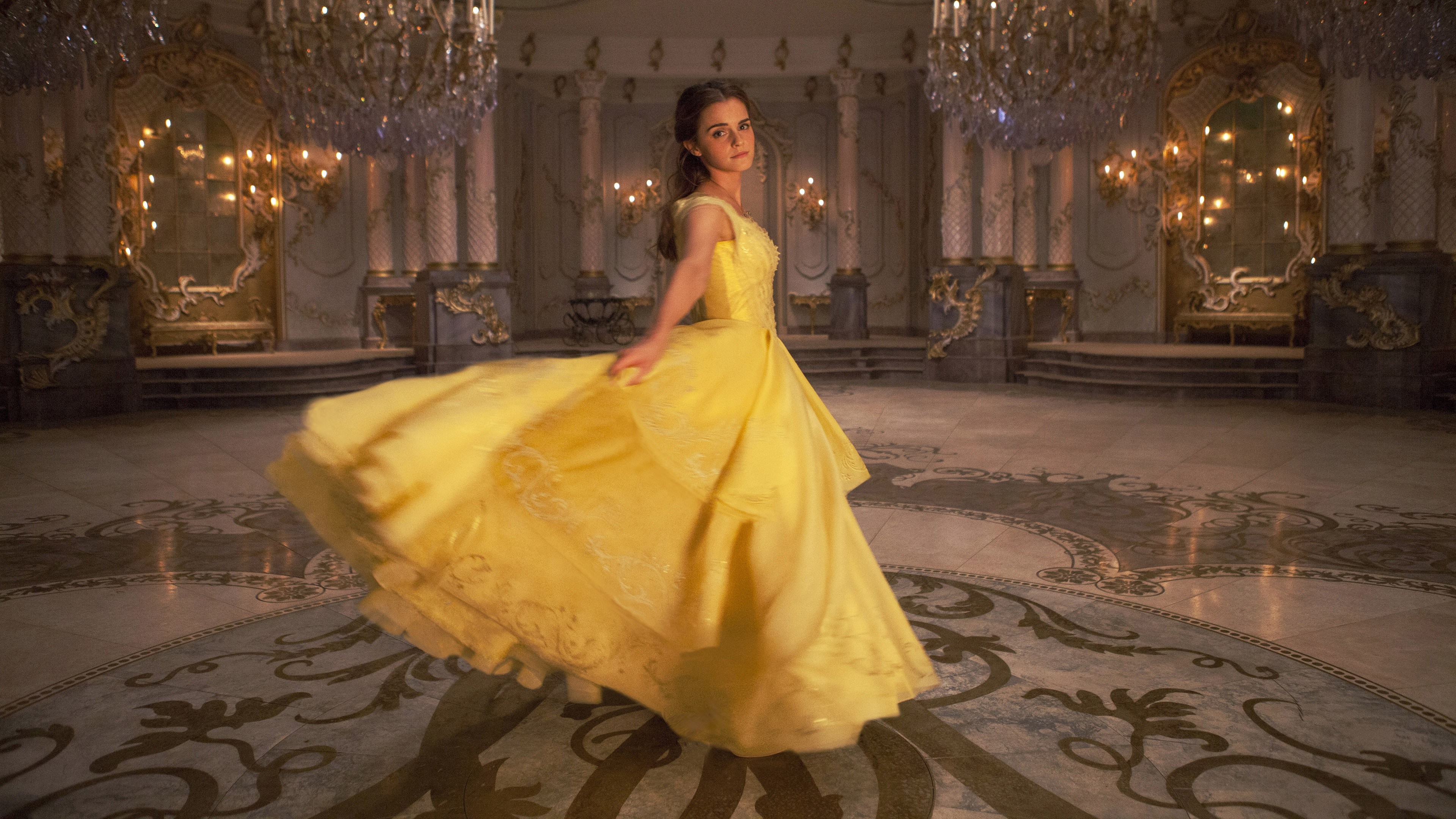 Emma Watson as Belle in a yellow ball gown HD Wallpaper