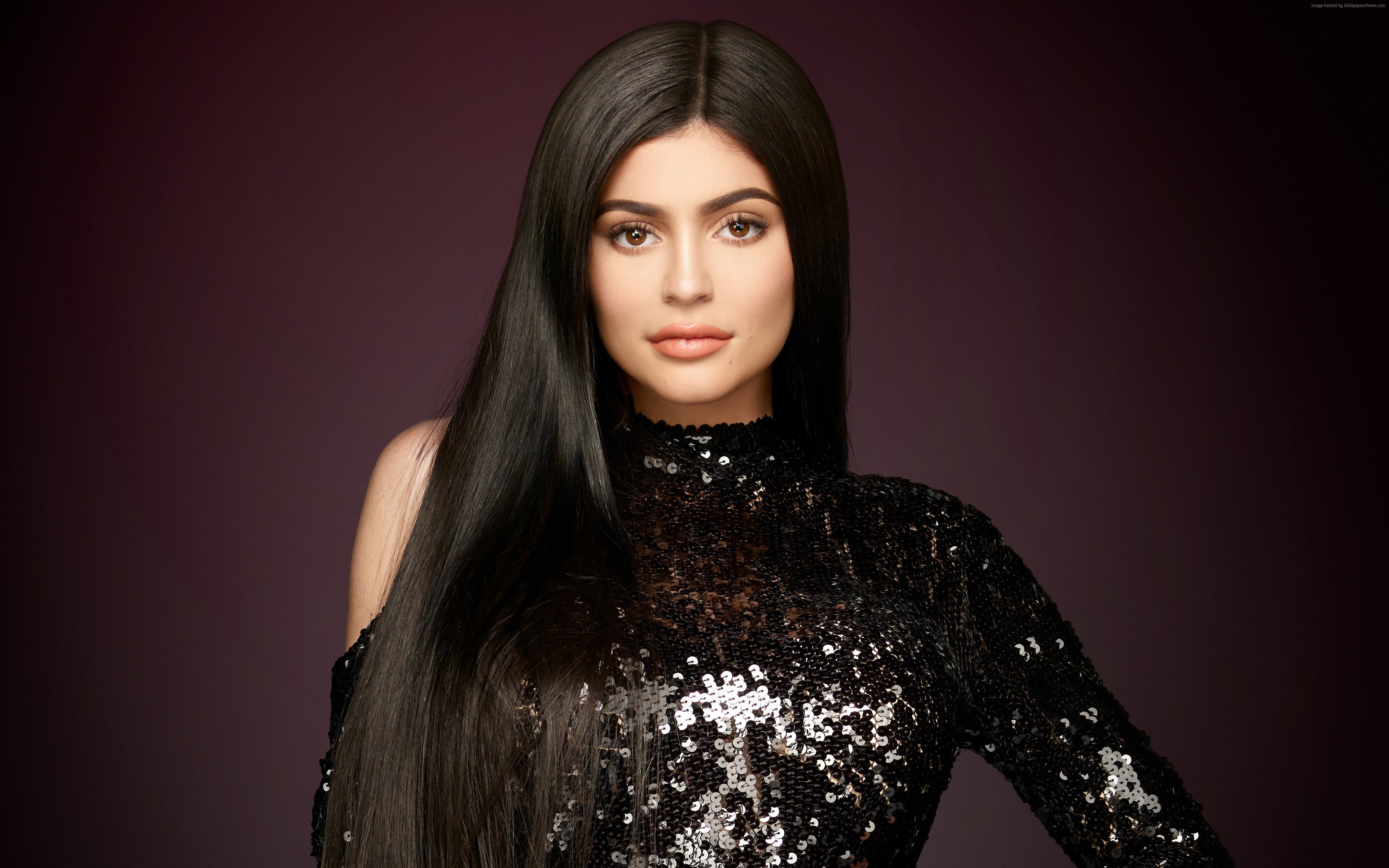 Kylie Jenner in a black sequined dress HD Wallpaper